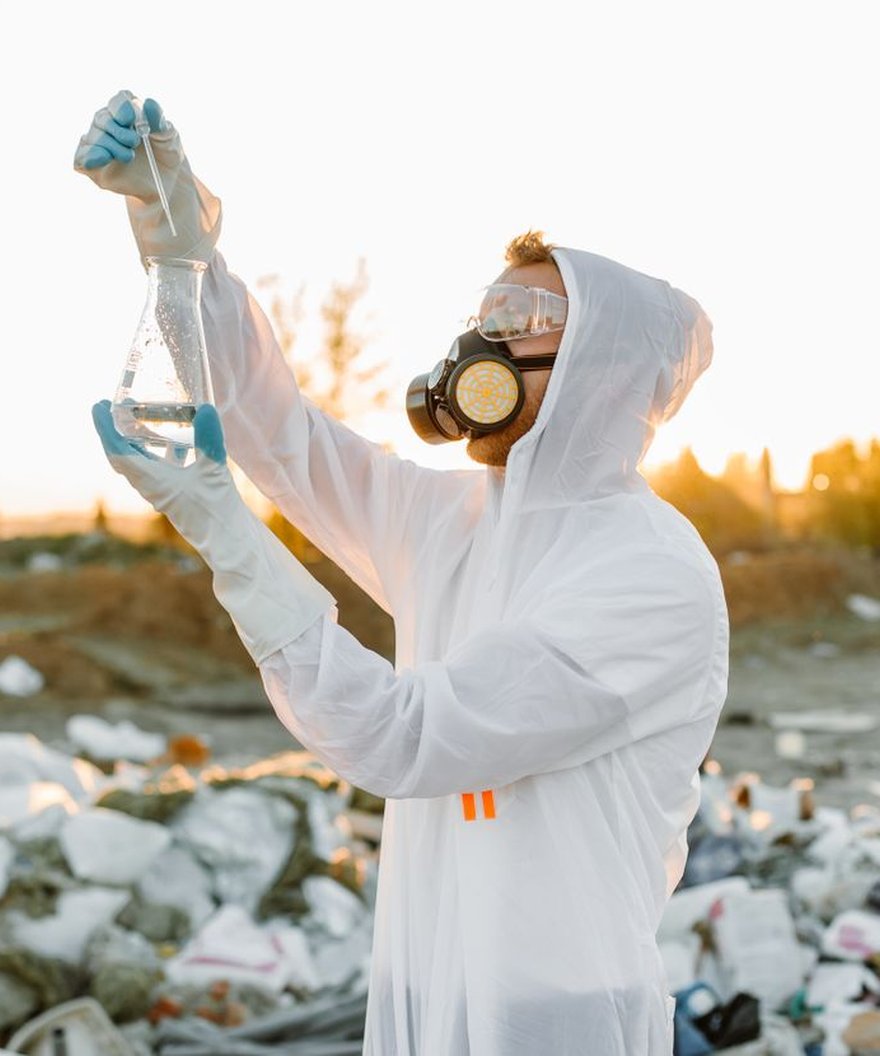 Field scientist collecting samples at a remediation site